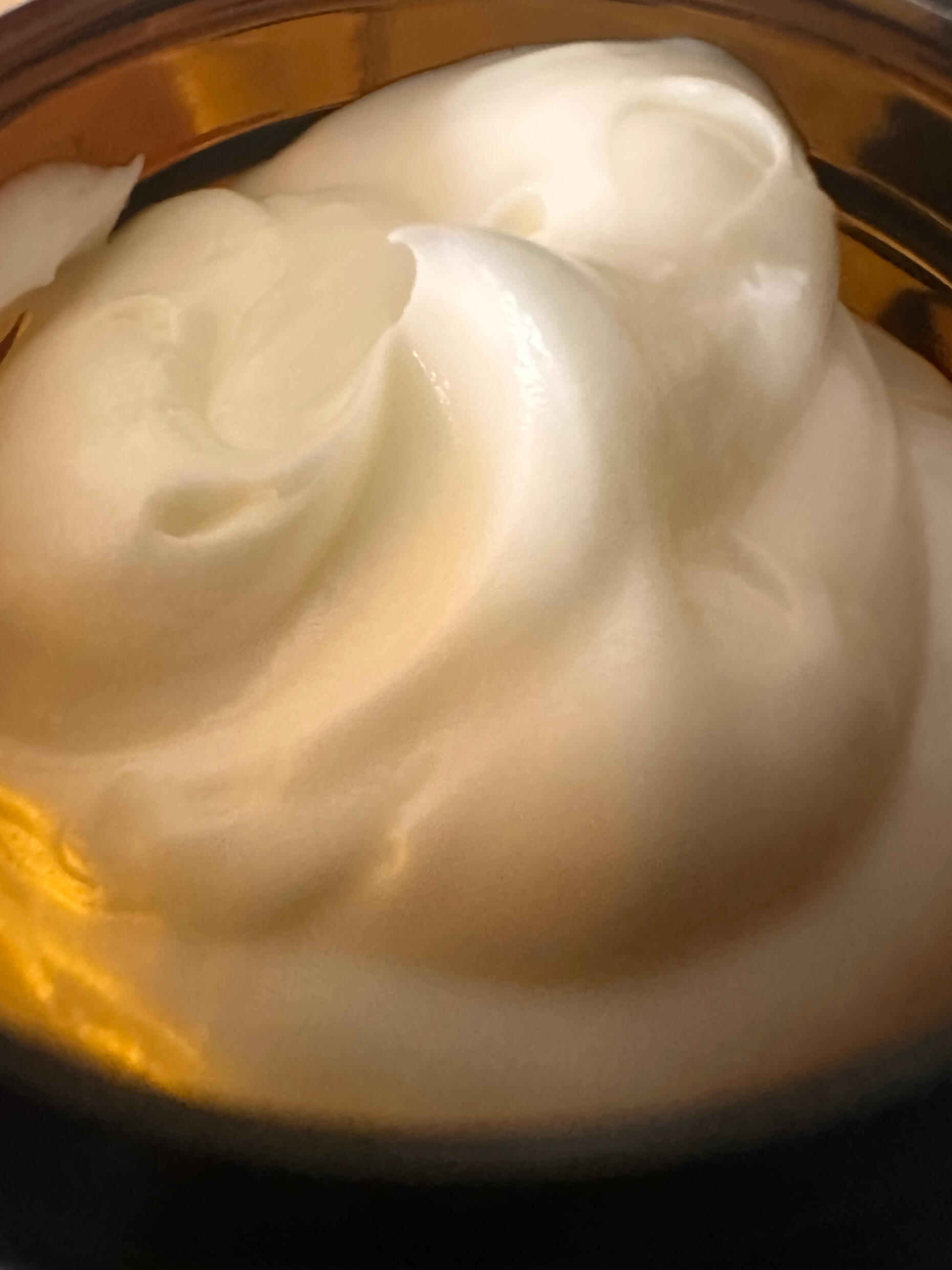 Whipped Beef Tallow Balm Close-up of Emerald Tallow Balm inside an amber glass jar, showing its rich, creamy whipped texture with a smooth, glossy finish.